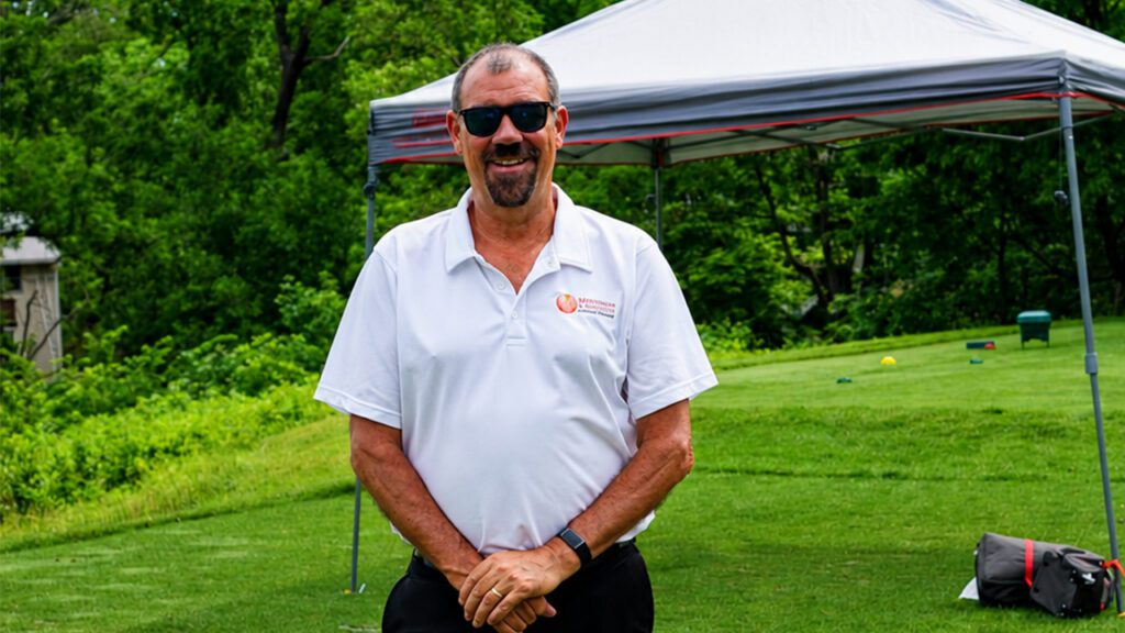 Golfer Fore the Heroes Charity Golf Outing Menninger & Associates Financial Planning