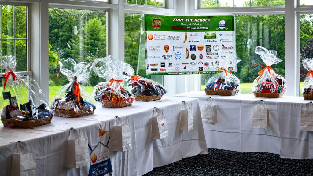 Prize table Fore the Heroes Charity Golf Outing Menninger & Associates Financial Planning