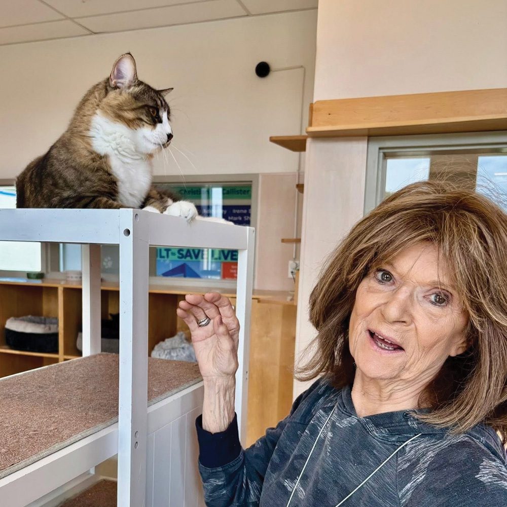 Senior woman with cat Waltonwood University