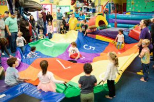 Tumble-Bee Gymnastics playing with children