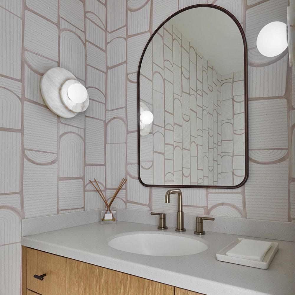 Bathroom with wallpaper Design + Build Renegades