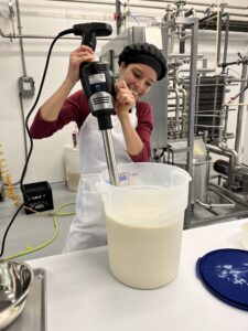 Credit Ekaterina Belova - stock.adobe.com worker churning gelato