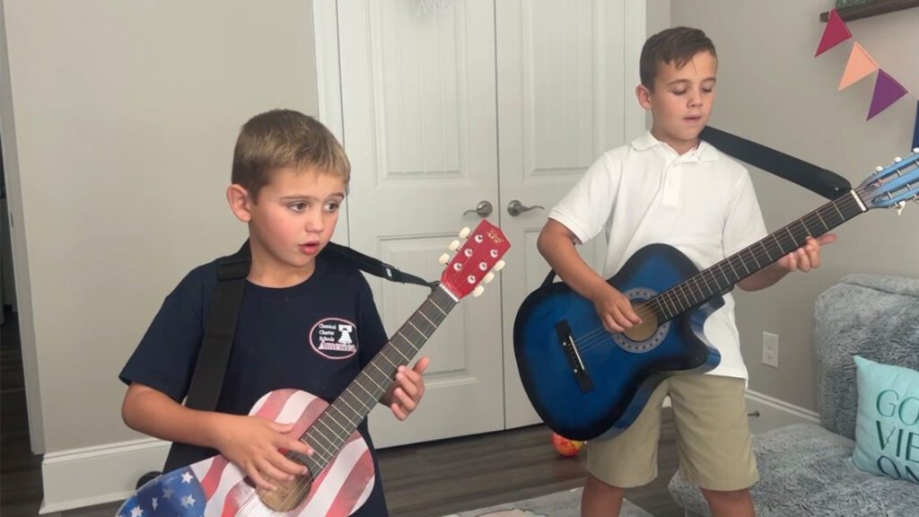 Mike surprised both of Nolan's sons with guitars of their own - Discover NC Homes
