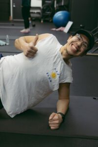 Tranzform Fitness Grand Haven zach working out