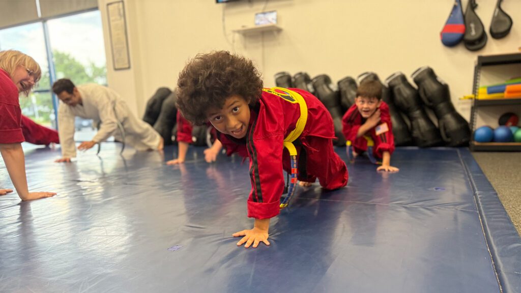 Young boy at martial arts class TM Martial Arts