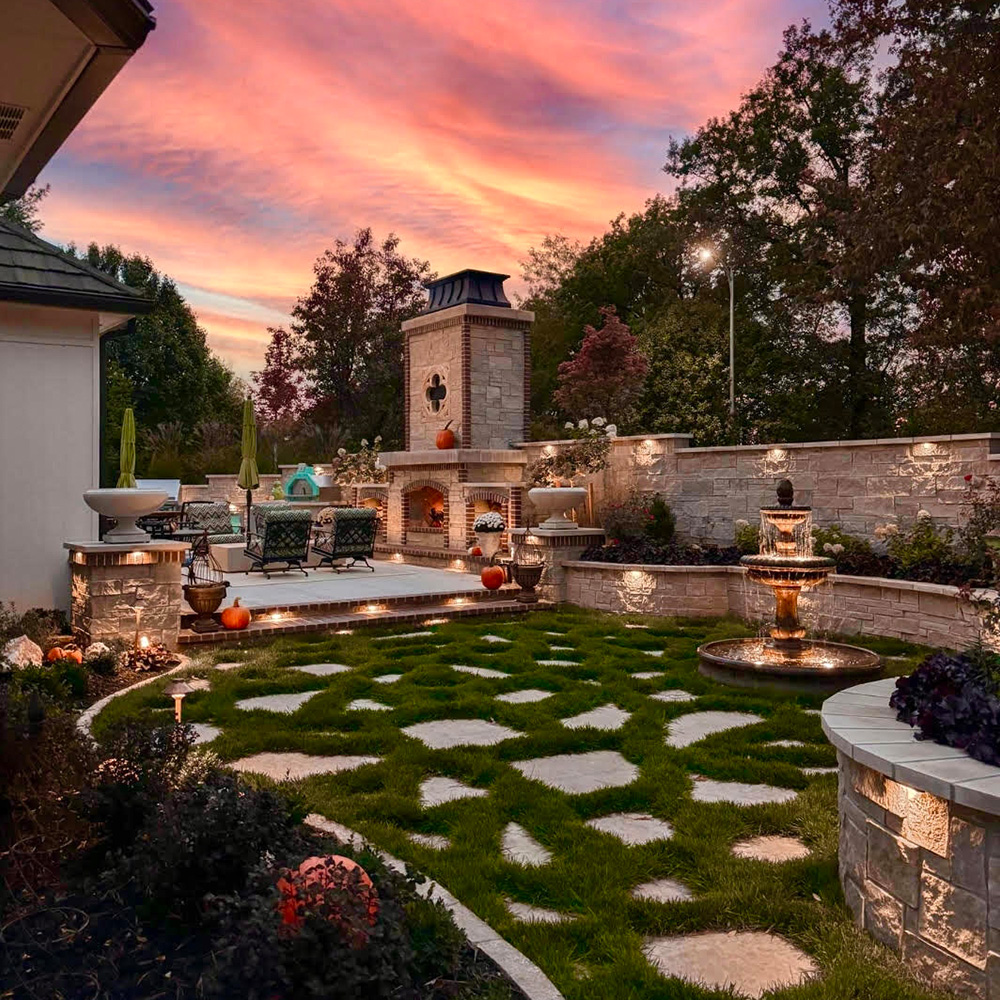 Backyard with lighting Trey's Lawn & Landscape