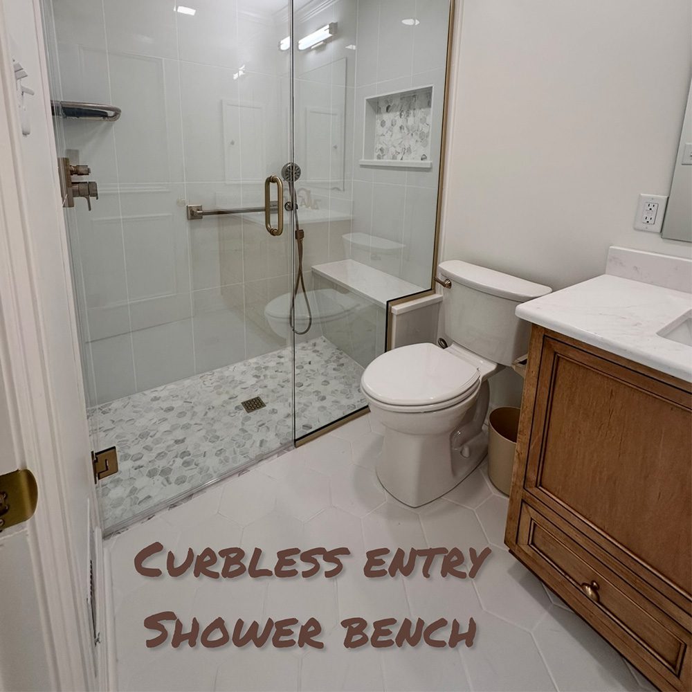 Bathroom with curbless entry and shower bench Jil Young Designs
