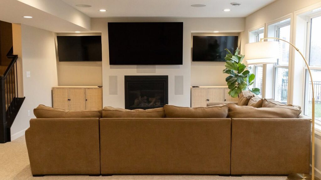 Living room couch and TVs Fulsaas Exteriors