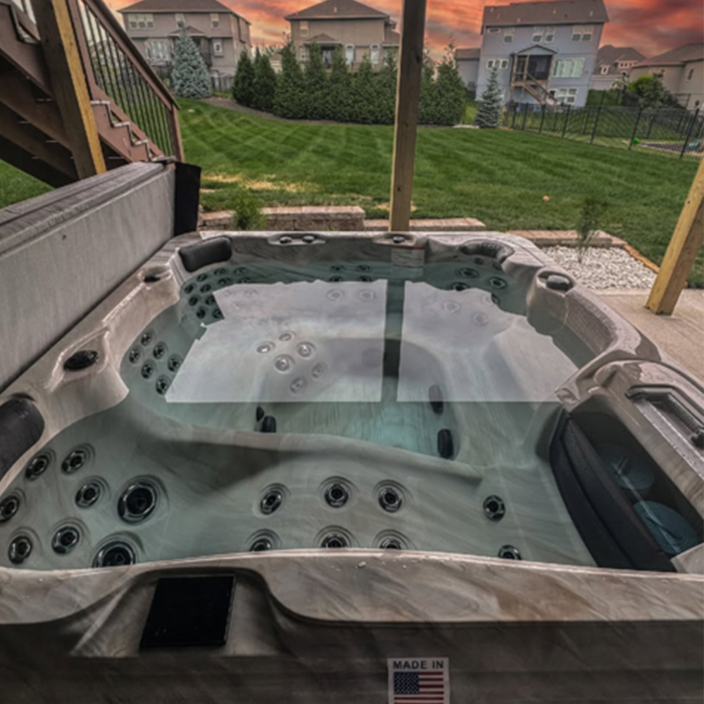 Outdoor hot tub Trey's Lawn & Landscape