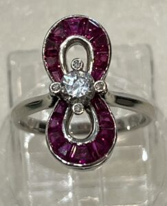 Ruby and diamond Bow ring Ross Goldsmith