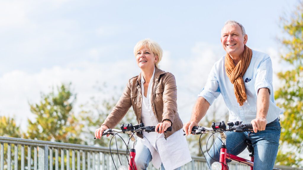 Senior couple biking