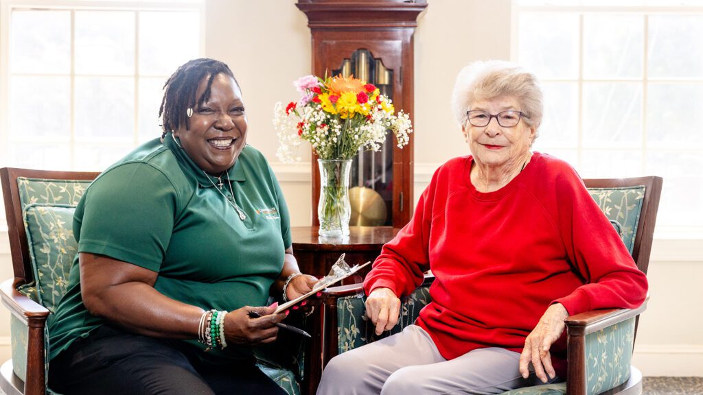 Senior woman and caretaker Commonwealth Senior Living at Gloucester House