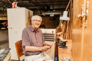 Summit Pointe Senior Living Community eldelry man crafting
