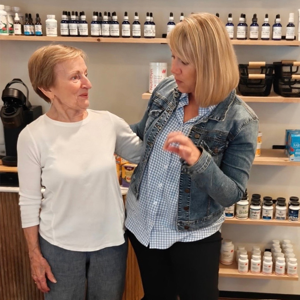 Talking with customer Power of Life Alternative & Holistic Health