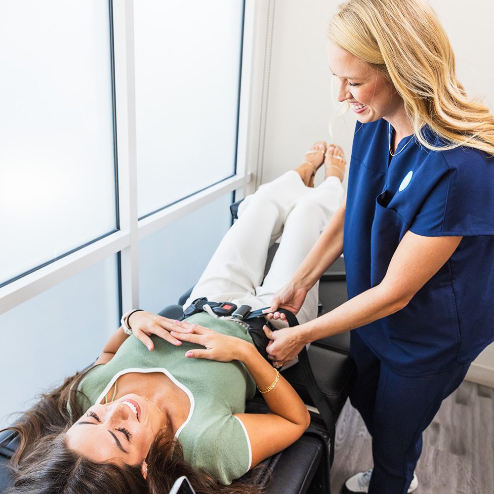 Woman with specialist at Thrive Health Center