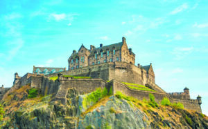 Scenic view of Edinburgh Castle over blue sky, Scotland
